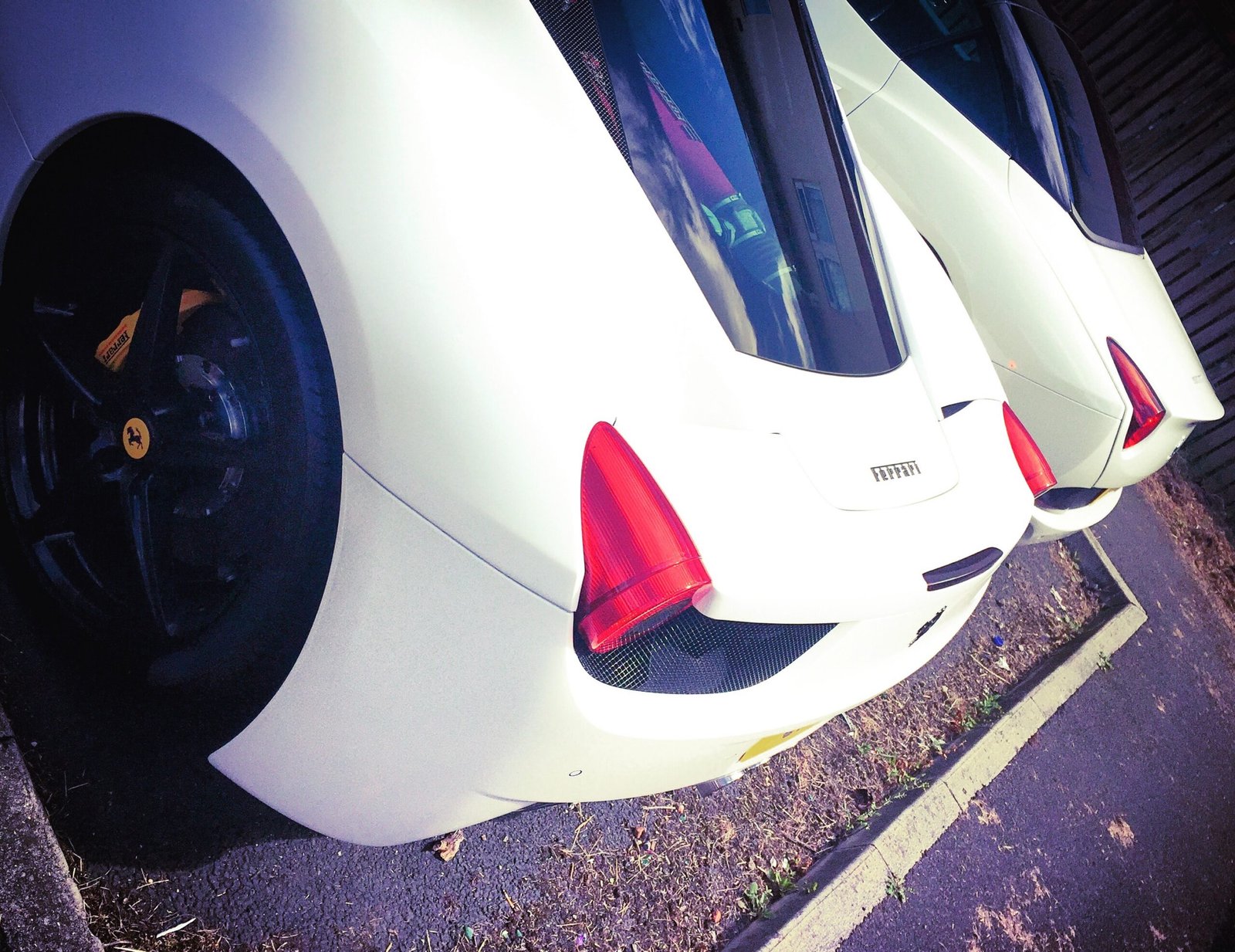 two white ferrari 458 italias