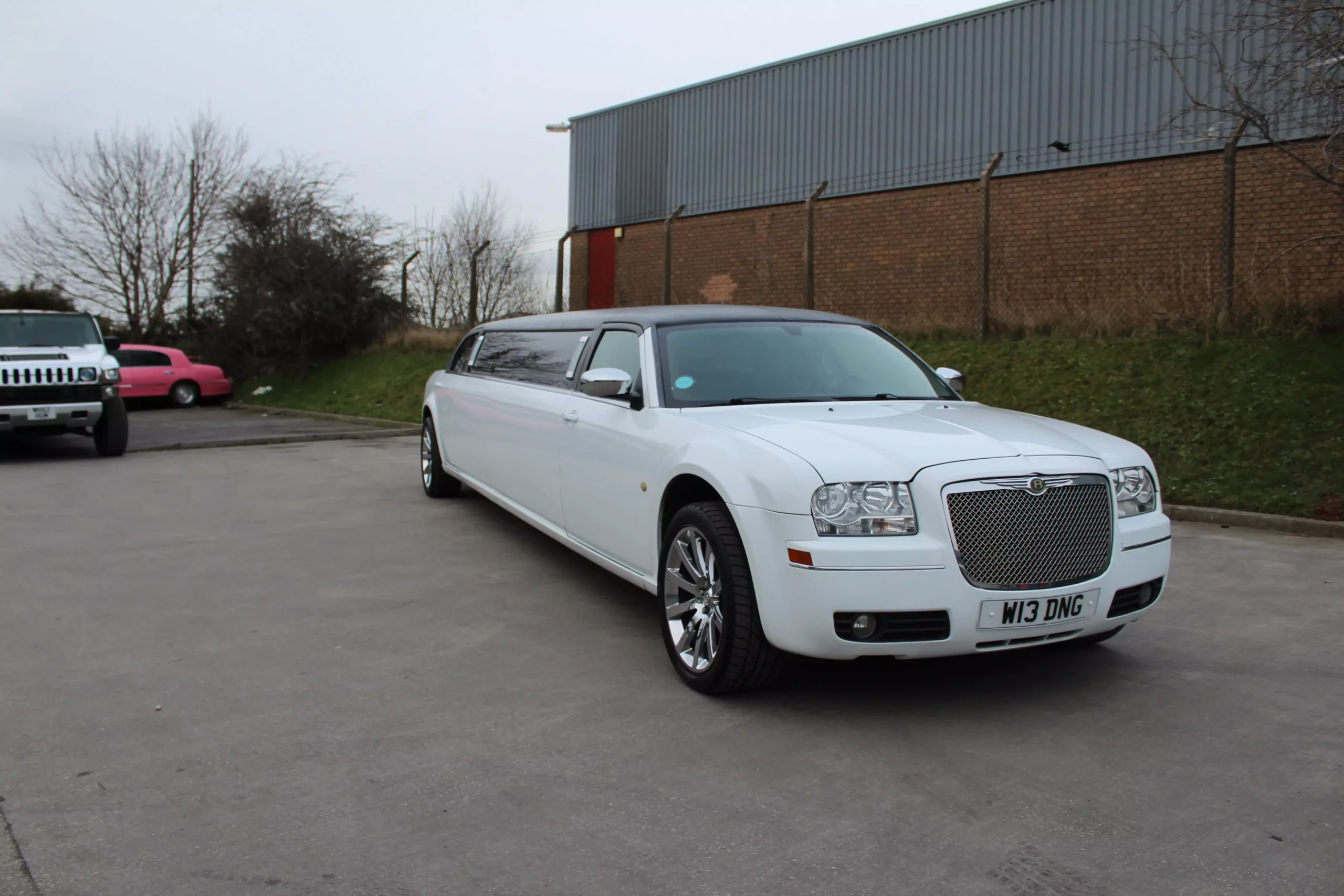 stretch white chrysler baby bentley limo