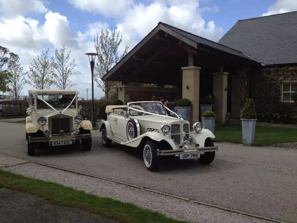 vintage wedding cars decorated for wedding