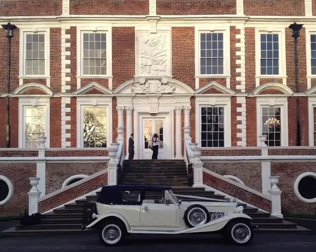 vintage beauford wedding car at london wedding