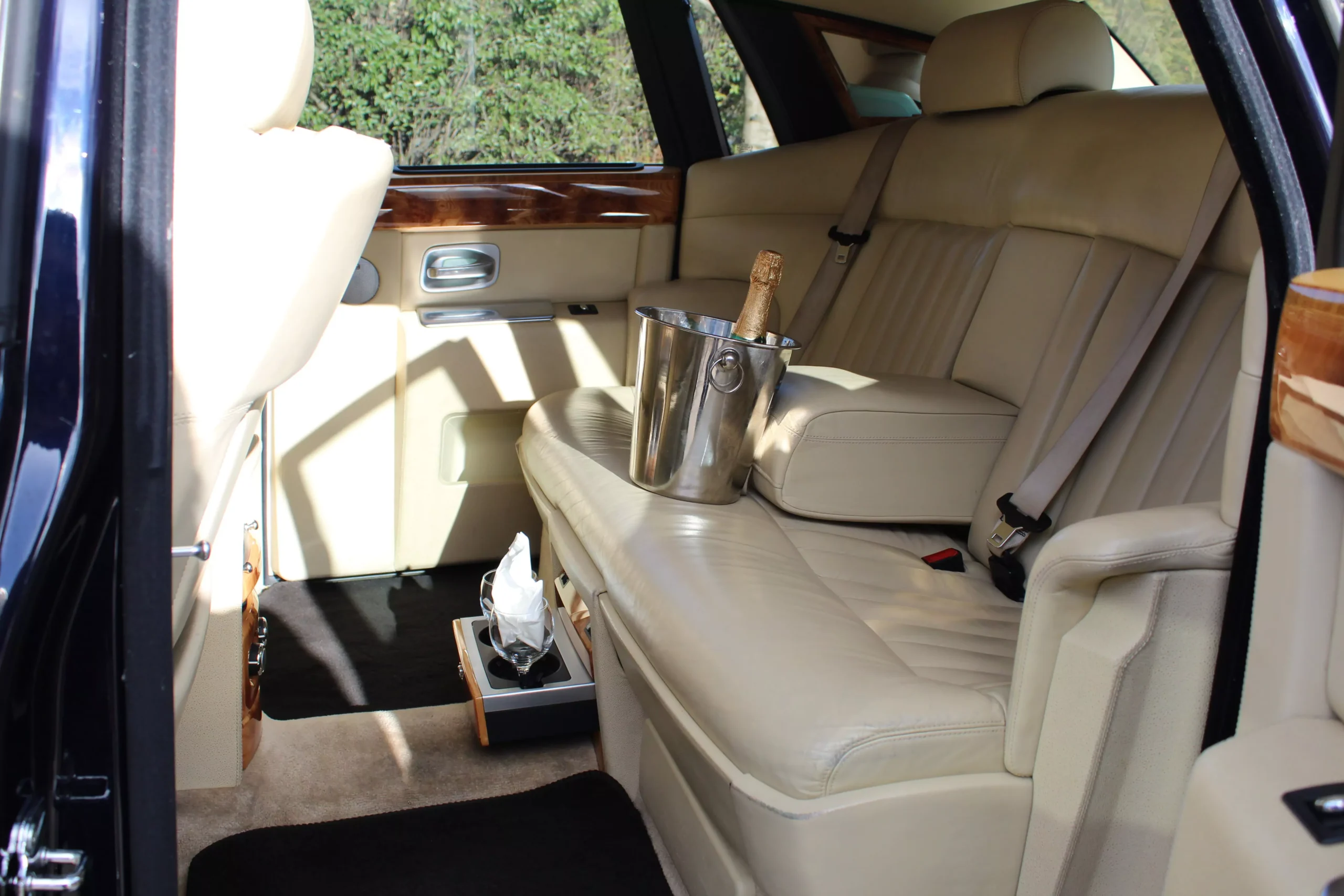 rolls royce phantom interior with complimentary drinks