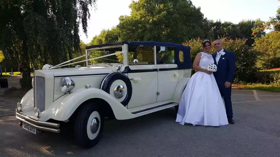 regent convertible wedding car with bride and groom