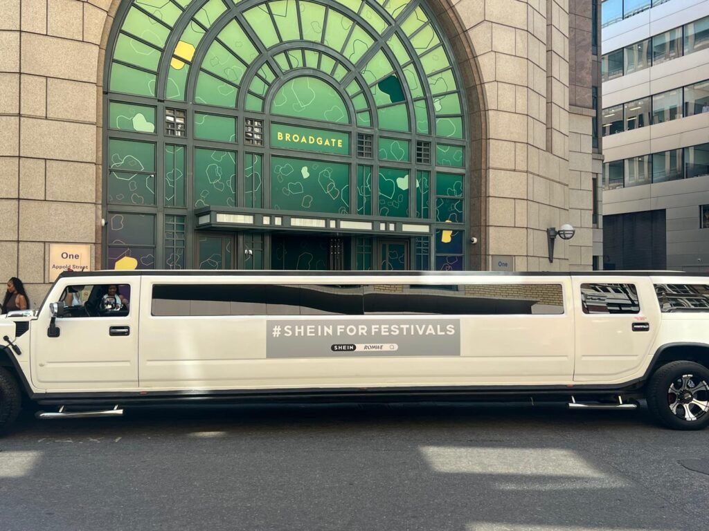 SHEIN branded Hummer H2 limousines prepared for event transport
