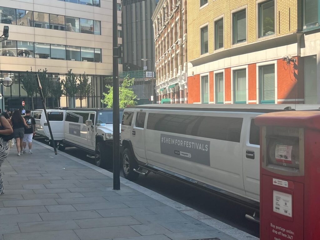 SHEIN campaign branding fitted to a white stretch Hummer limousine