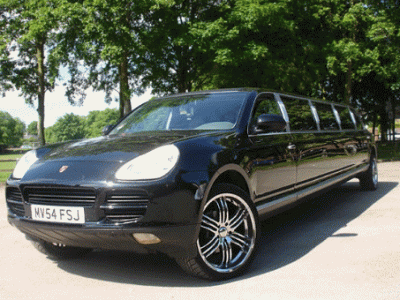 Chauffeur stretched black Porsche Cayenne limousine hire in London.